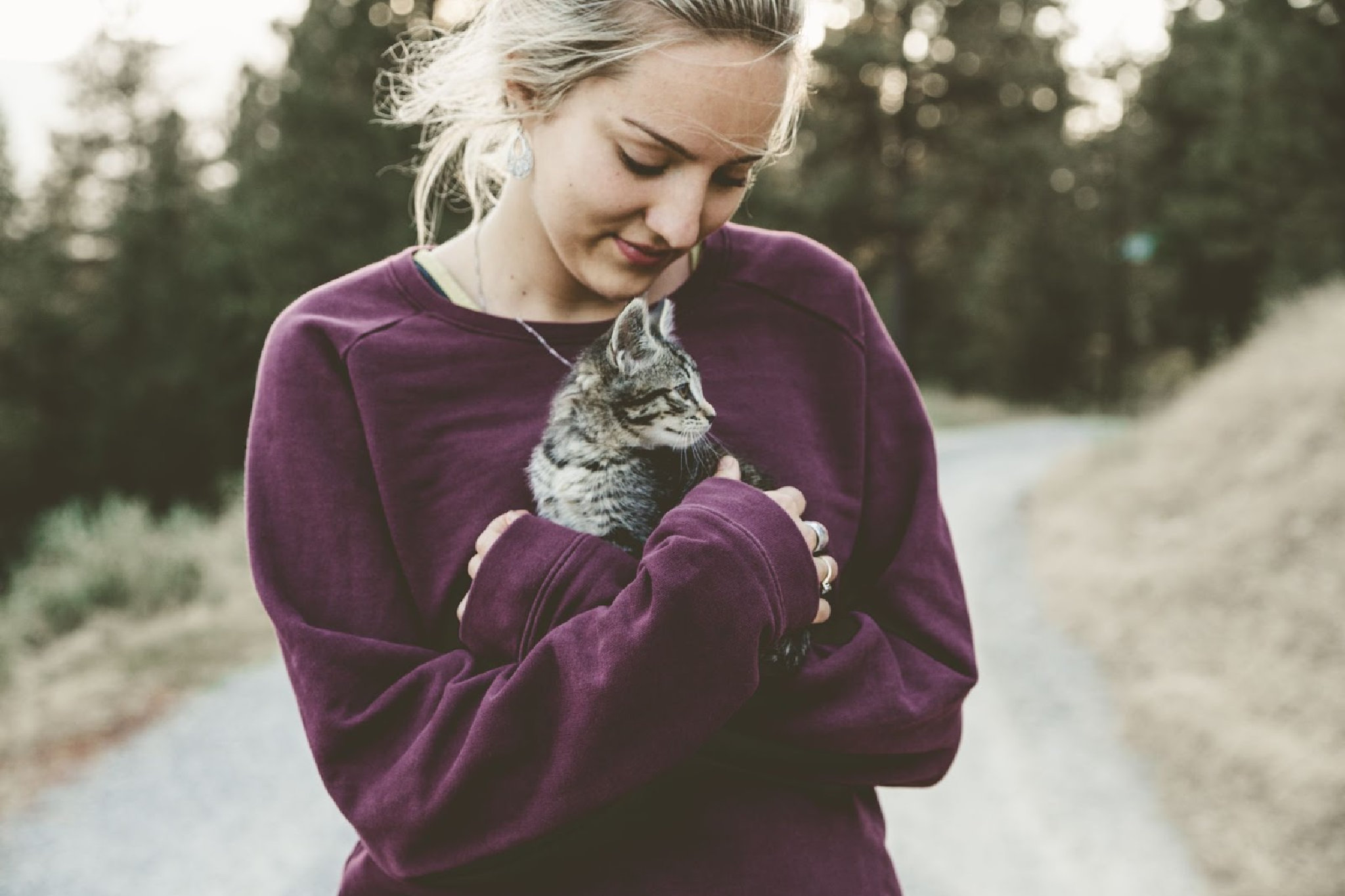 Women holding a pet